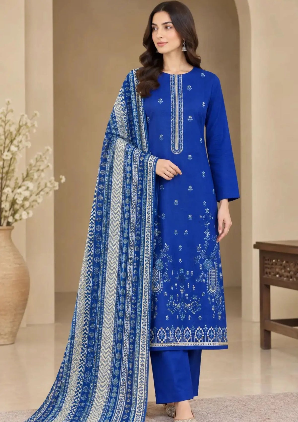 Three piece winter outfit with embroidered front shirt, plain back, plain trouser and printed dupatta
