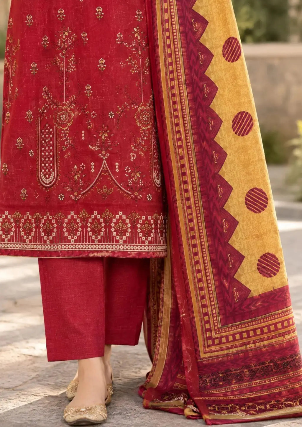 Unstitched Khaddar three piece featuring an embroidered shirt, plain trouser and printed dupatta
