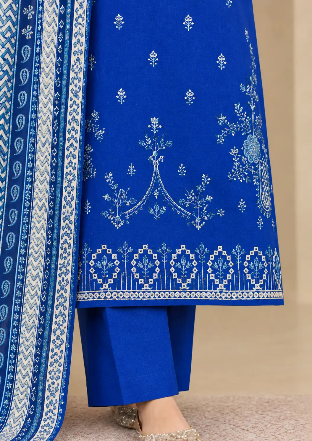 Unstitched embroidered shirt ensemble paired with a patterned dupatta and plain trouser

