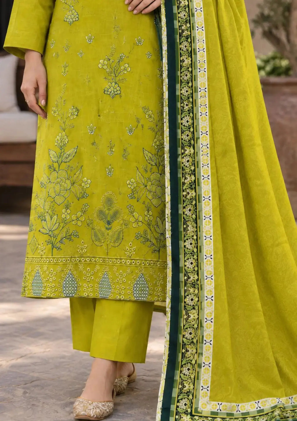 Winter unstitched three piece featuring detailed embroidered shirt front, plain trouser and patterned